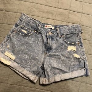These are girls levi shorts only damage is one belt loop